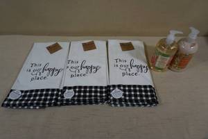 lot 17 image: 3 Kitchen Towels With Hand Soap and Lotion