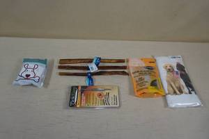 lot 102 image: Dog Treats, Tick Tweezers, Hip and Joint Treats, Costume