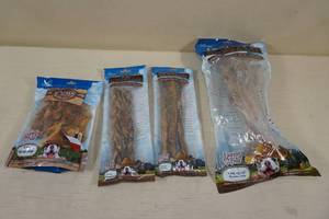 lot 103 image: Dog Treats - Pig Ear Strips, 9 Braided Bully Sticks, 11 Bully Sticks, Shoulder Bone
