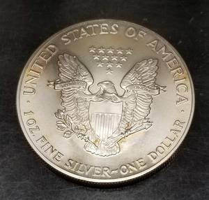 1986 AMERICAN SILVER EAGLE 1 TROY OZ .999 FINE SILVER DOLLAR