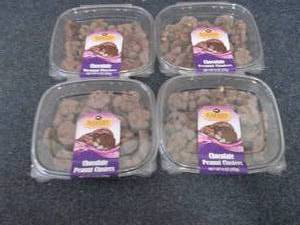 lot 18 image: 4- 9 oz Chocolate Peanut Clusters...