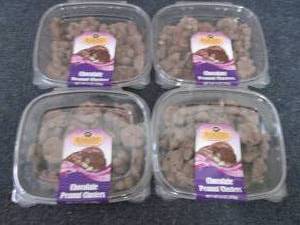 lot 20 image: 4- 9 oz Chocolate Peanut Clusters...