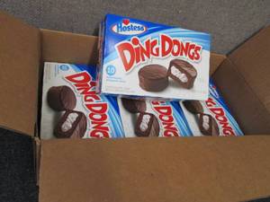 lot 26 image: 4-12.7 oz Boxes Hostess Ding Dongs...