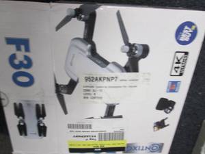 lot 2 image: Contixo F30 4K UHD Wi-Fi Camera Fol...