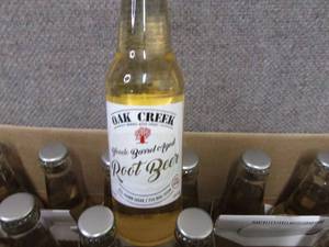 lot 225 image: Case of 24 - 12 oz Bottles Oak Cree...