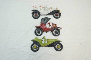 lot 119 image: cast iron car wall decor