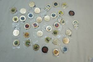 lot 203 image: Jurassic Park Coins