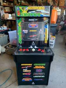 lot 71 image: ONE UP ARCADE WITH 12 GAMES