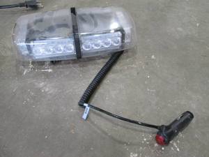 lot 82 image: Vehicle plug light kit measures 11x...