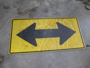 lot 96 image: Metal. sign measures 48x24...
