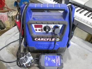 lot 101 image: Carlyle battery booster pack...