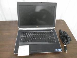 lot 123 image: Dell laptop computer with charger c...