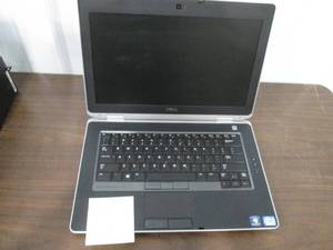 lot 125 image: Dell laptop computer with charger c...