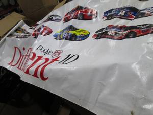 lot 131 image: Dodge banner measures 28x76...