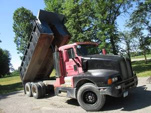 lot 1 image: 1994 Kenworth Dump truck. Comings m...