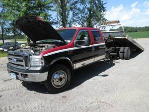 lot 2 image: 1999 F550 7.3 diesel roll back truc...