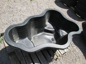 lot 37 image: Pond liner measures 50x33 at wides...