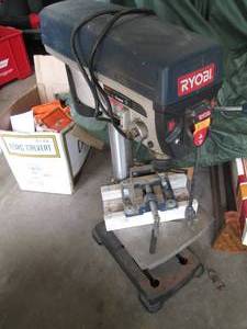 lot 65 image: Ryobi drill press with attachment...