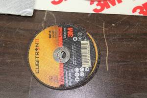 lot 676 image: Lot of (16) Sanding Discs, Sanding Wheels, Disc Pads, Cut-Off Wheel, Disc Pad Hub (in original packaging)