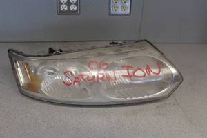 lot 773 image: 2006 Saturn Passenger Headlight Assembly