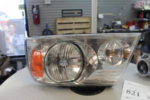 lot 821 image: Ford F-150 Headlight and Housing (Builders Quality)