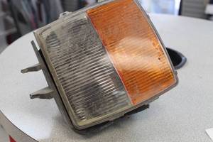lot 845 image: GM Fog Light and Turn Signal Assembly (Builders Quality)