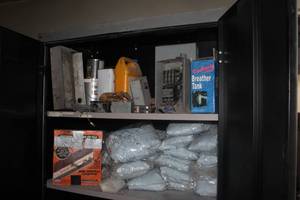lot 1115 image: Storage Cabinet Contents