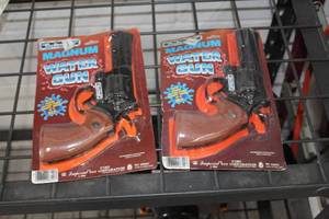 lot 448 image: Lot of (2) Imperial Toy Company The Real Stuff 357 Magnum Water Gun (in original packaging)