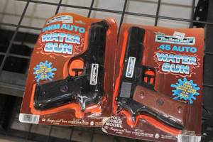 lot 451 image: Lot of (2) Imperial Toy Company The Real Stuff 9mm Auto  .45 Auto Water Gun (in original packaging)