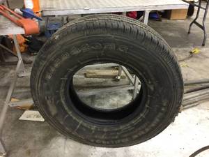 lot 165 image: Firestone Steeltex LT26575R16 Tire