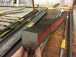 lot 243 image: 2 x 2 12 x 40 Titanium Bar Stock