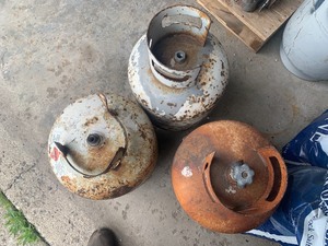 3 Old Propane Tanks