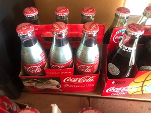 lot 50 image: Coca Cola Glass Bottles 6-packs