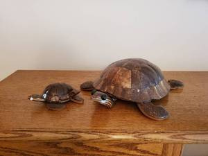lot 16 image: Two Wood Turtle Wall Hangings