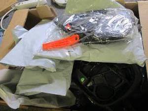 box of bike seats and pads ...