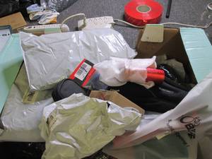 box of bike seats and pads ...