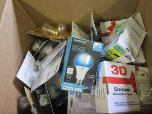 box of night lights and light bulbs...