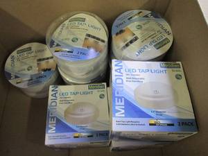 box of 8 LED tap lights and strin...