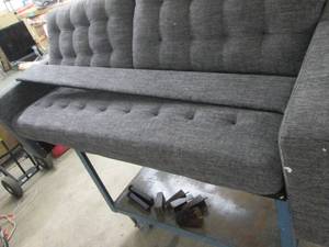 couch front needs to be put back o...