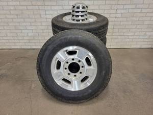 lot 183 image: (SET OF 4) 34-1 Ton Chevrolet Truck Rims and Tires - LT24575R7 - 8x180mm Bolt Pattern