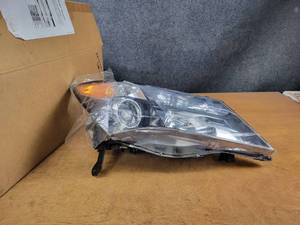 lot 184 image: USED 2010-2013 Cadillac MDX Headlight Assembly - Part No. 33101STXA21-RE