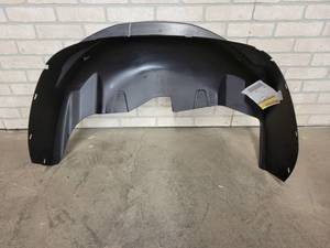 lot 198 image: NOS GM Rear Driver Side Wheelhouse Liner - Part No. 15938665