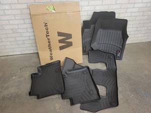lot 375 image: Slightly Used WeatherTech 2021-2022 Jeep Grand Cherokee 1st, 2nd and 3rd Row Floor Mats - Part No. 4416961, 4416962 and 4416964