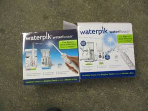 2 Waterpik Water Flosser Sets...