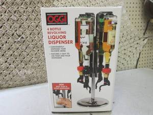 lot 69 image: (CSB) 4 Bottle Revolving Liquor Dis...