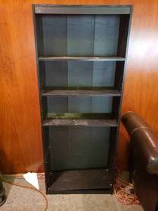 lot 53 image: Black Book Shelf