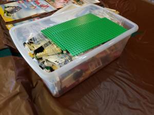 lot 121 image: Small Tote of Legos and Manuals