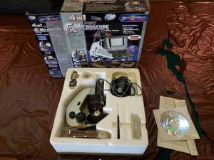 lot 122 image: 4 in 1 Petite E Microscope