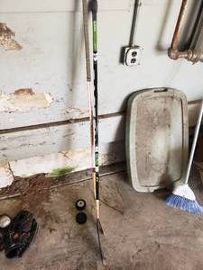 lot 179 image: 2 Hockey Sticks and 2 Pucks