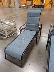 lot 212 image: Hampton Bay Crestridge Steel Padded Sling Outdoor Patio Chaise Lounge in Conley Denim